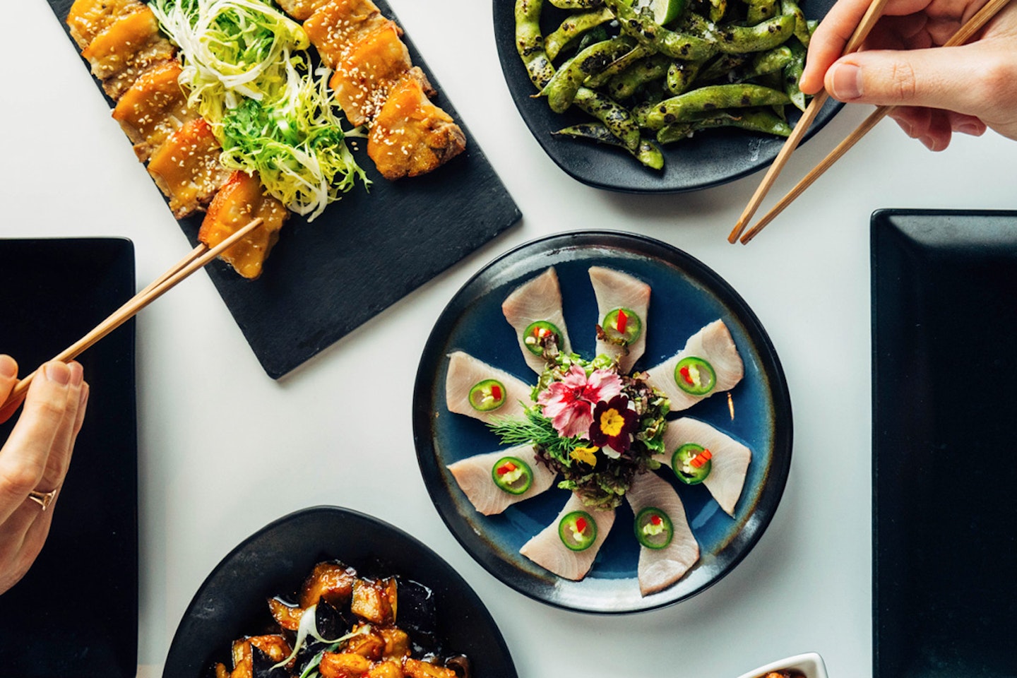 Interactive Pan-Asian Eight Dish Sharing Menu with Fizz for Two at Inamo, London