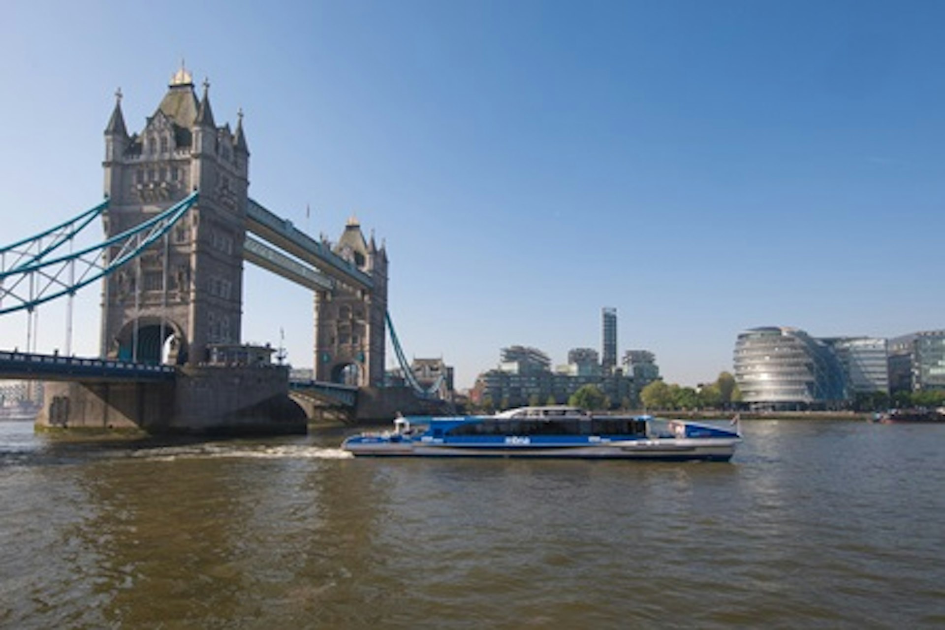 A Vintage Red London Bus Tour and Thames Cruise for Two 3