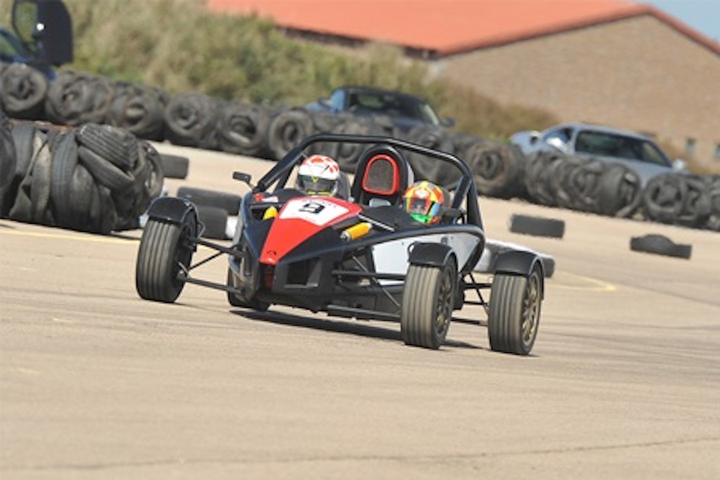 Drive a Supercharged Ariel Atom with a High Speed Passenger Ride in a Radical Race Car 1