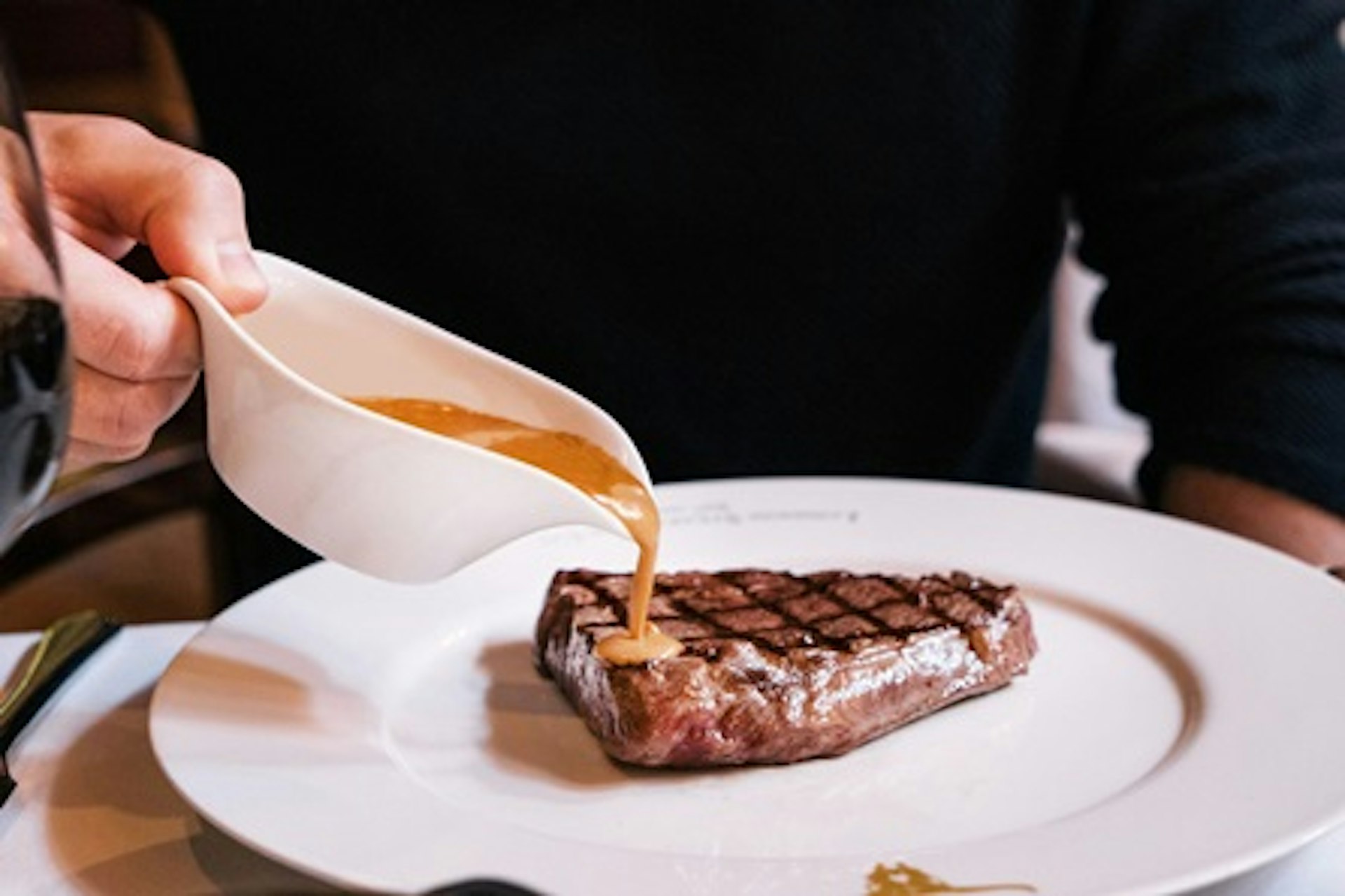 Set of Steak Knives with Apron and Three Course Dining Experience and Cocktail for Two at Marco Pierre White's London Steakhouse Co 1